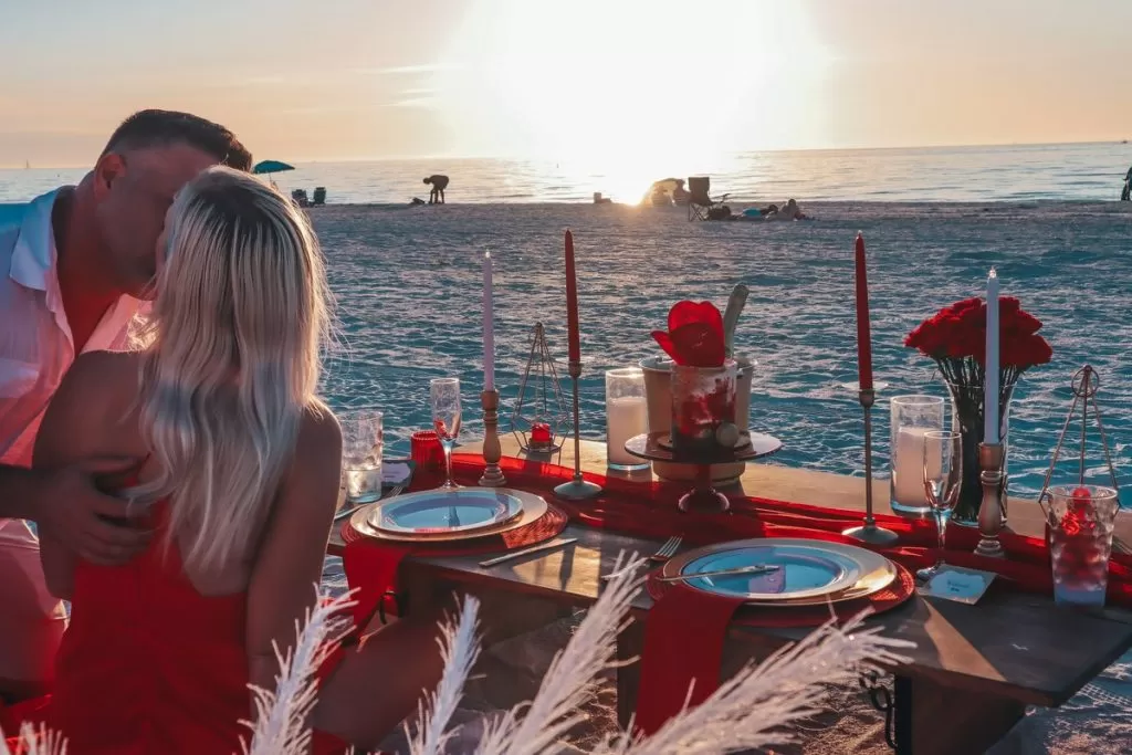 Romantic picnic date night on the beach at sunset St Pete Beach